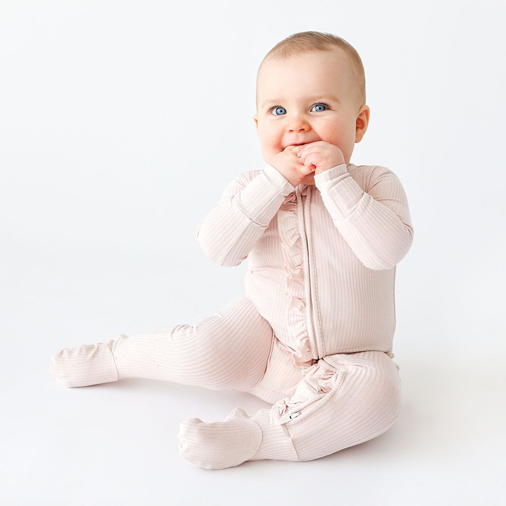 Sandy Blush Ribbed Footie Ruffled Zippered One Piece
